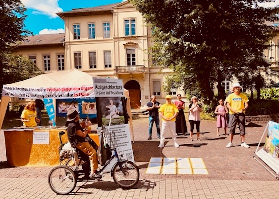 Image for article Germany: Public Condemns the 25-Year-Long Persecution of Falun Gong During Event in Heidelberg