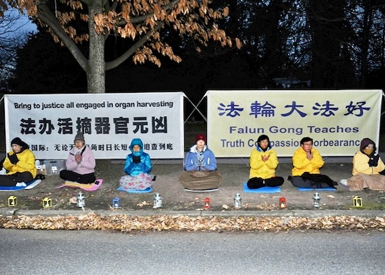 Image for article Canberra, Australia: Practitioners in Canberra Held a Candlelight Vigil to Mark 25 Years of Persecution by CCP