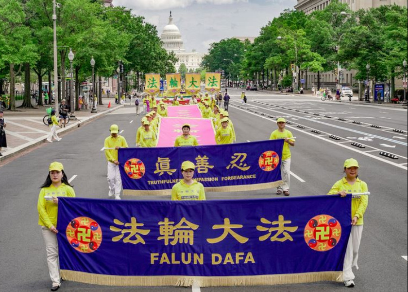 Image for article Washington DC: Spectators Commend Falun Gong March on 26-Year Mark of the Persecution in China