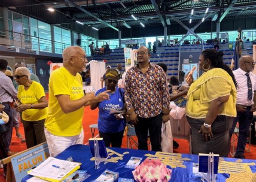 Image for article Caribbeans Learn About Falun Dafa at Community Association Fairs in Guadeloupe, France